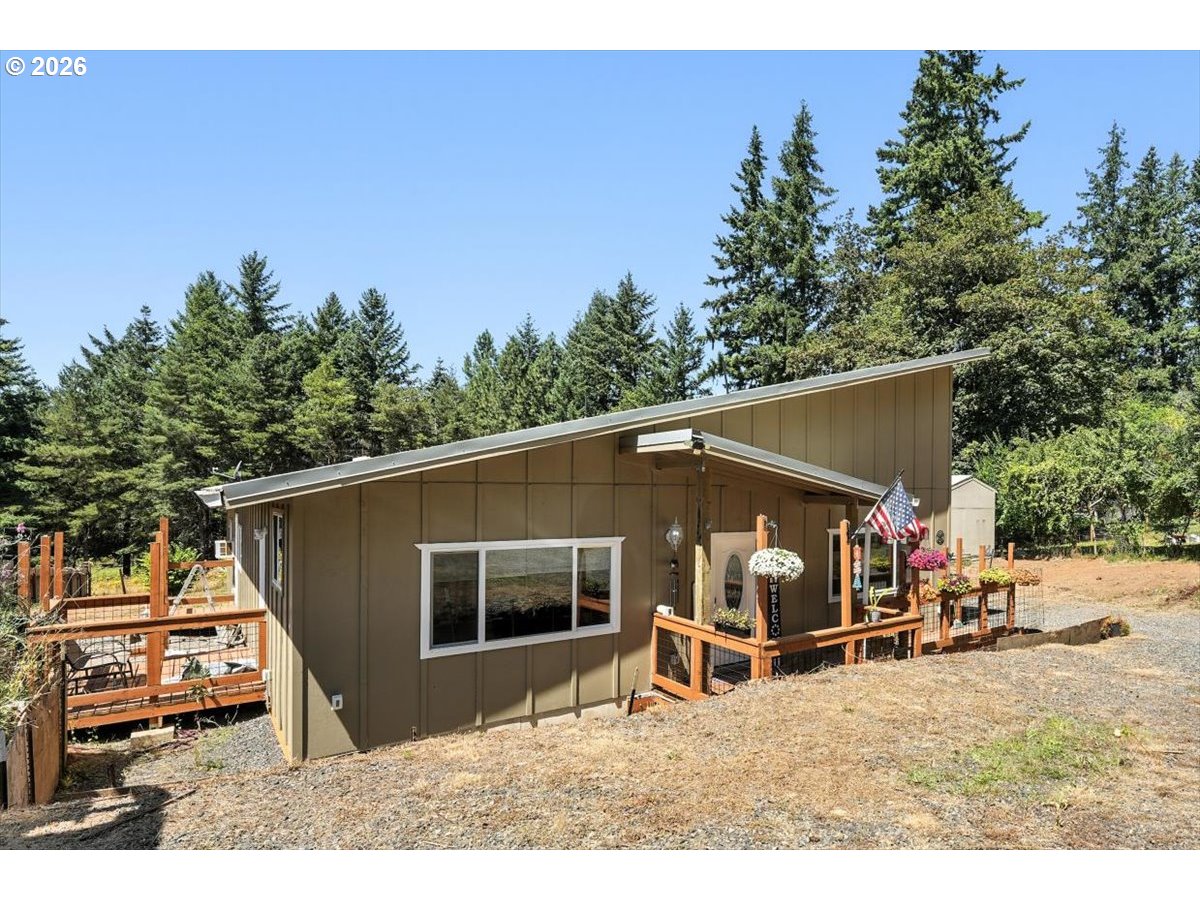 34155 Southeast Moss Hill Road Estacada, OR 97023 - Photo 2 of 26 a view of a backyard