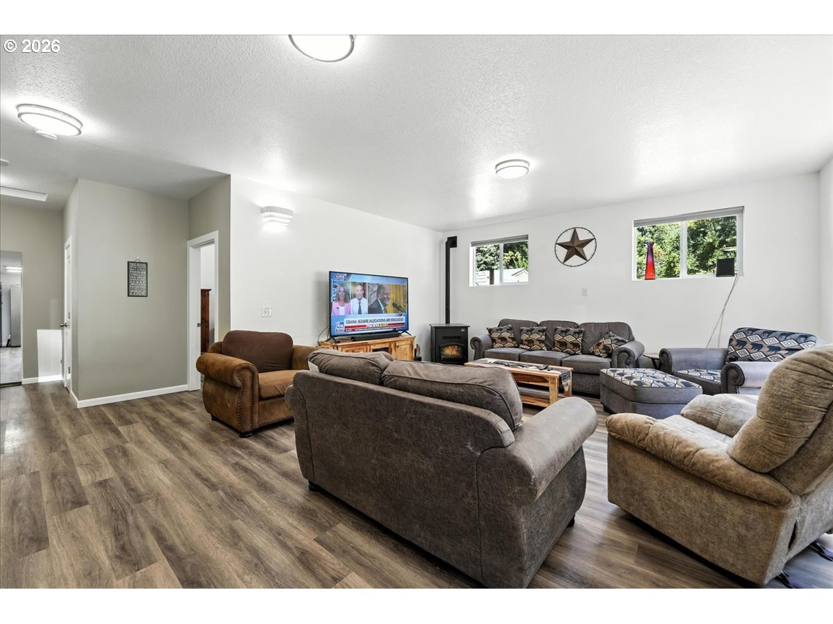 34155 Southeast Moss Hill Road Estacada, OR 97023 - Photo 4 of 26 a living room with furniture and a wooden floor