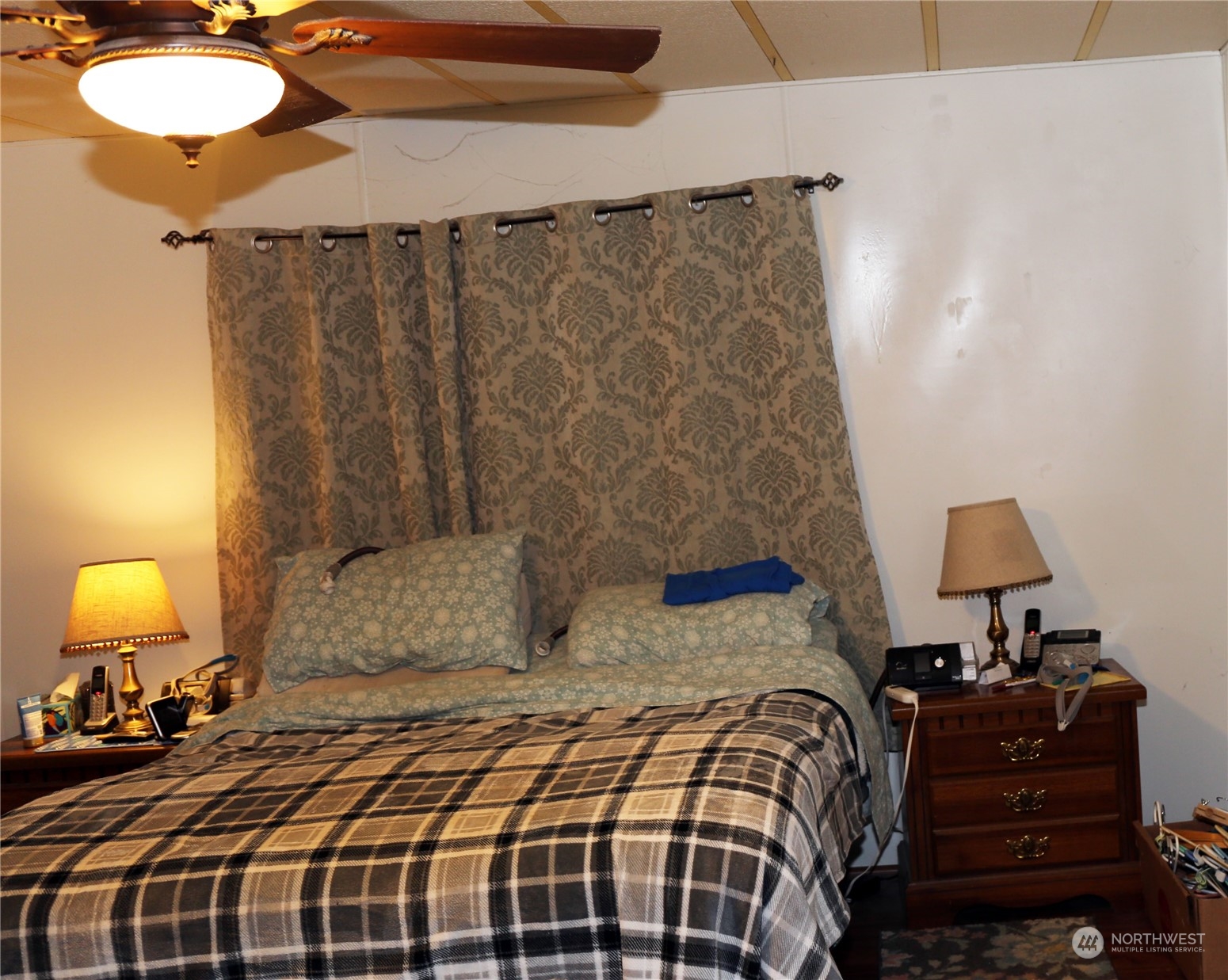 802 South Military Road Winlock, WA 98596 - Photo 12 of 14 a bedroom with a bed and lamp lamp