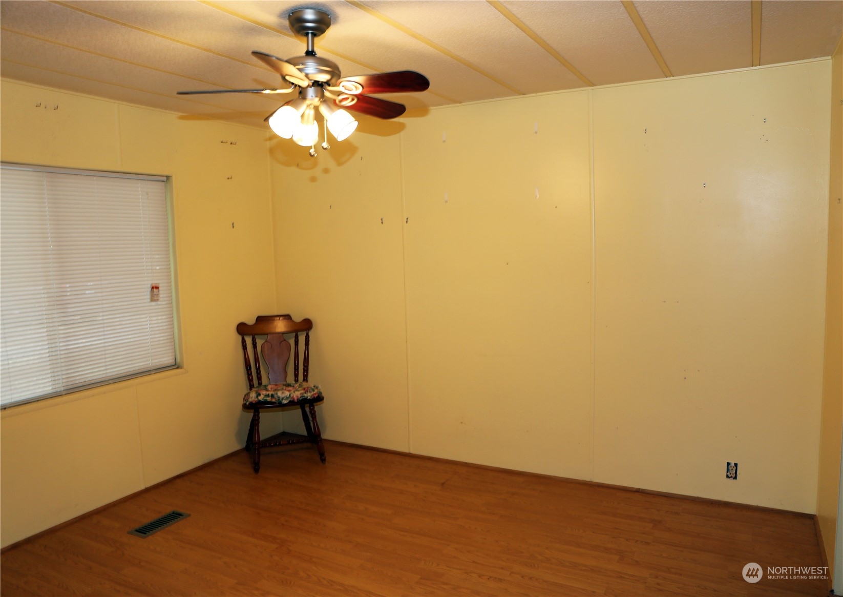 802 South Military Road Winlock, WA 98596 - Photo 10 of 14 a view of a room with a window and a ceiling fan
