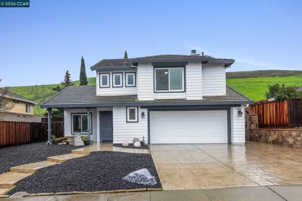 a view of a house with a patio