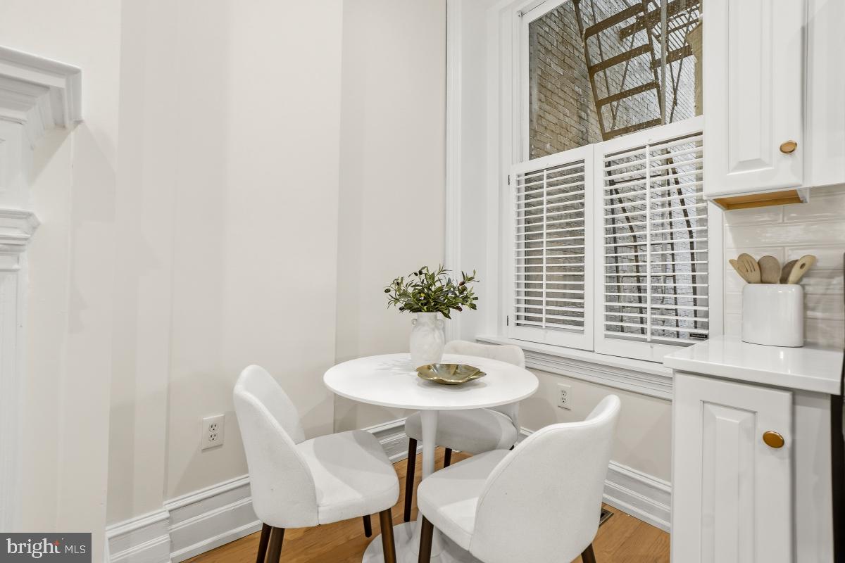 1706 16th Street Northwest, Unit 1 Washington, DC 20009 - Photo 13 of 55 a dining room with furniture and window