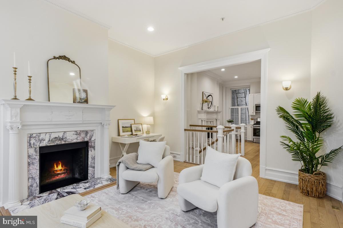 1706 16th Street Northwest, Unit 1 Washington, DC 20009 - Photo 6 of 55 a living room with furniture and a fireplace