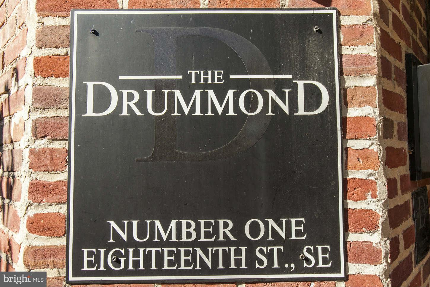 1 18th Street Southeast, Unit 301 Washington, DC 20003 - Photo 19 of 19 a sign broad on a pole