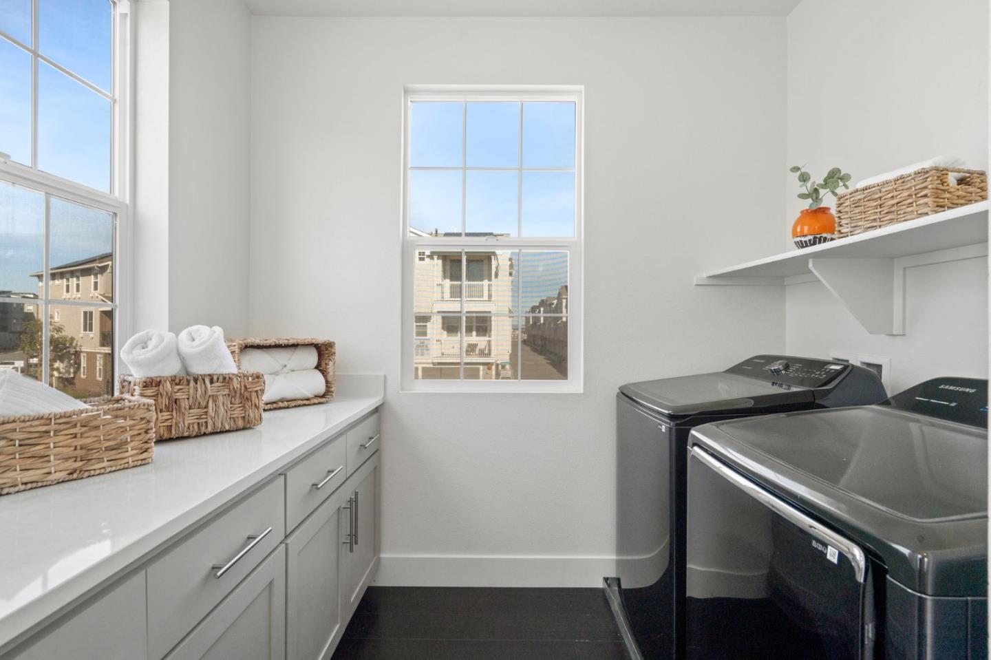 9488 Seawind Way Newark, CA 94560 - Photo 12 of 33 a kitchen that has a sink and a stove