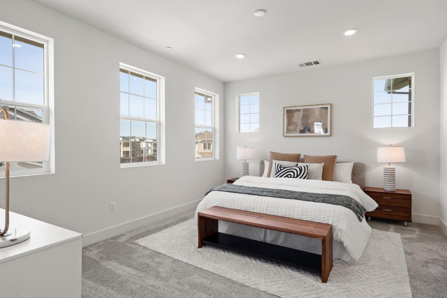 9488 Seawind Way Newark, CA 94560 - Photo 19 of 33 a spacious bedroom with a bed and a window