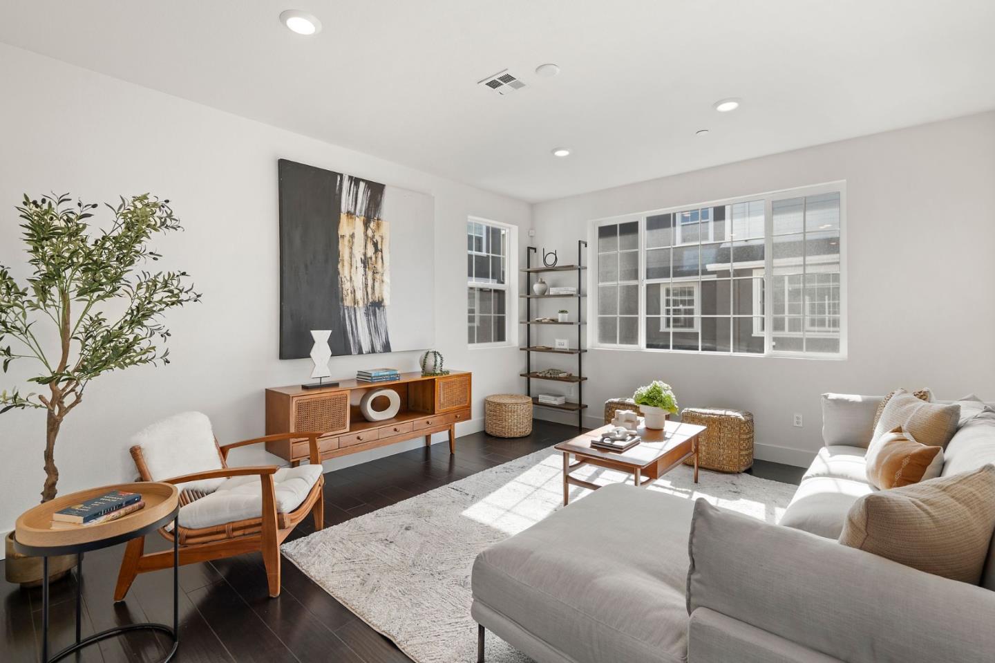 9488 Seawind Way Newark, CA 94560 - Photo 5 of 33 a living room with furniture and a potted plant