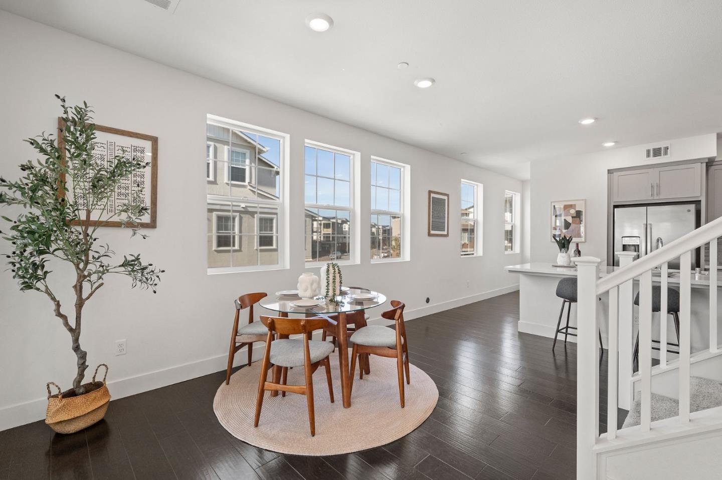9488 Seawind Way Newark, CA 94560 - Photo 7 of 33 a living room with furniture flowers and a window