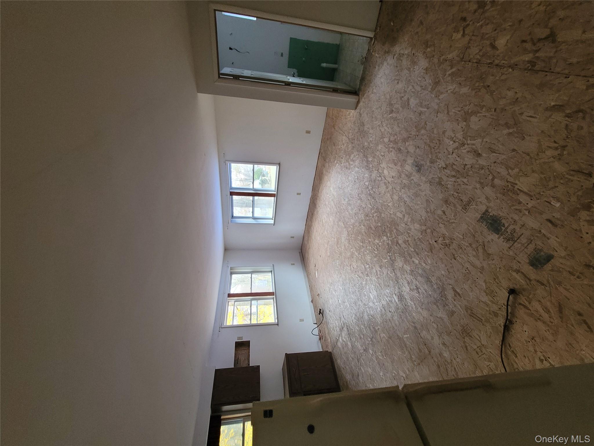 7 Smith Street Red Hook, NY 12571 - Photo 16 of 23 a view of livingroom with furniture and window