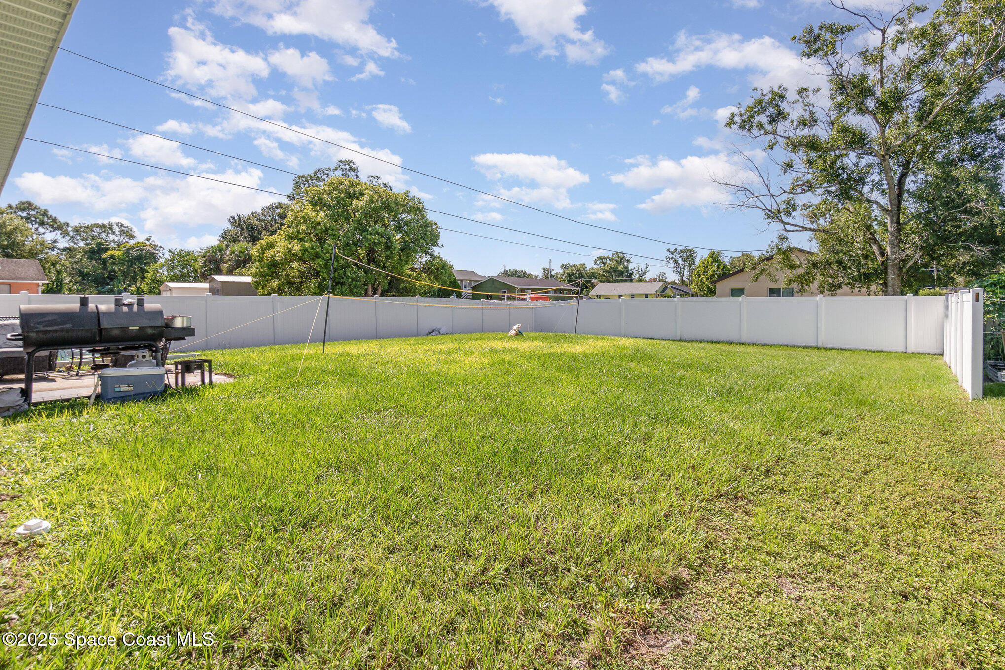 1534 Pine Street Orlando, FL 32824 - Photo 28 of 28 a view of a swimming pool and lounge chair