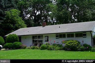 7315 Inzer Street Springfield, VA 22151 - Photo 2 of 23 a aerial view of a house next to a yard