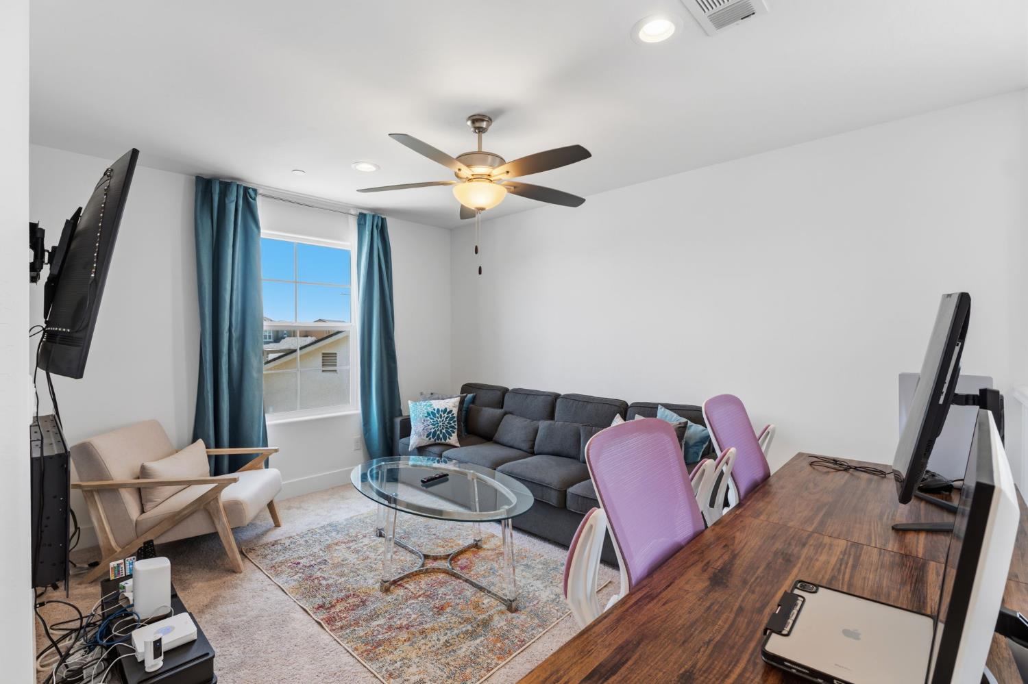 6326 West Richert Avenue Fresno, CA 93723 - Photo 21 of 45 a living room with furniture and a rug