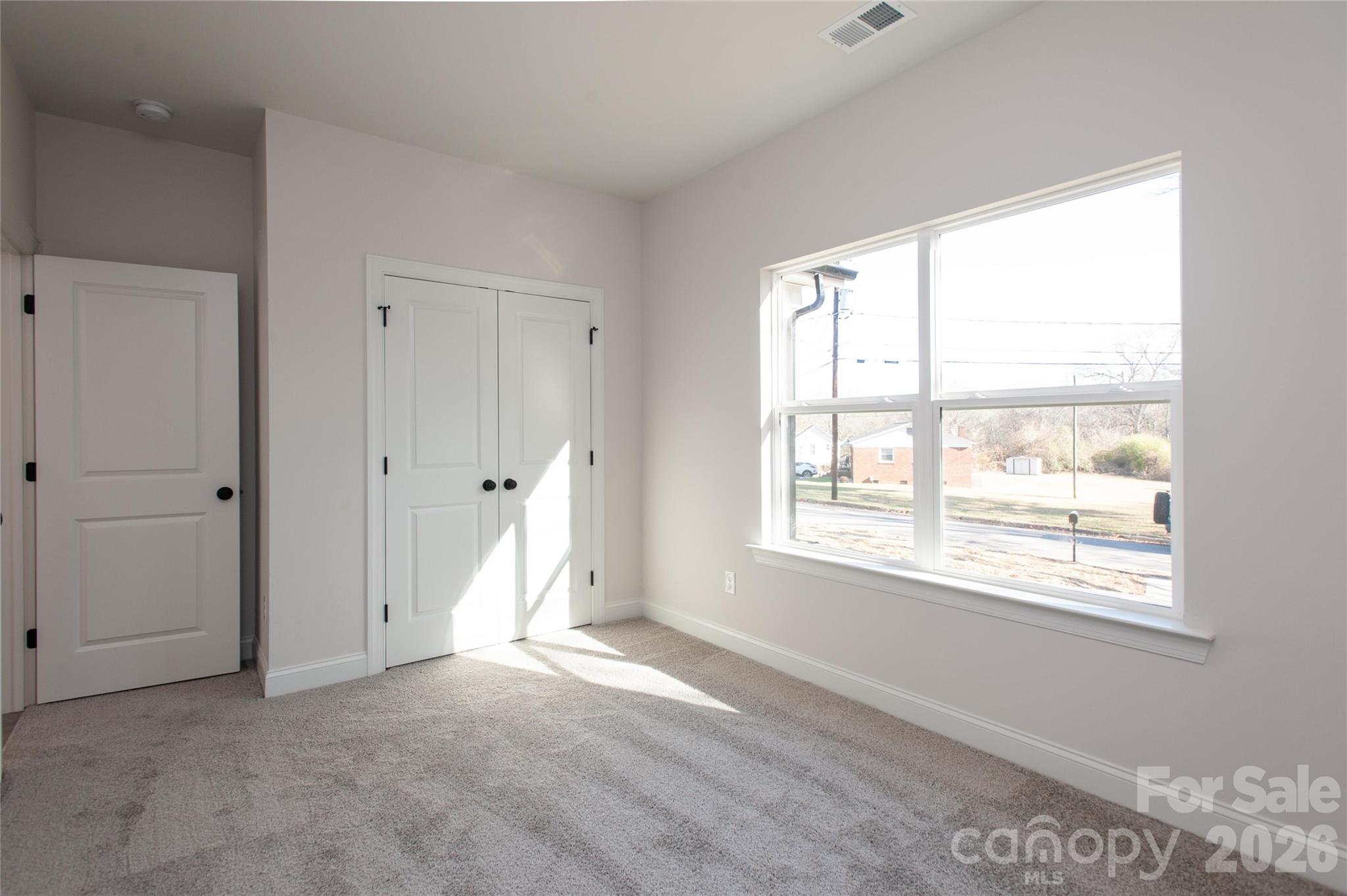 0 Lowesville Meadows Road Stanley, NC 28164 - Photo 20 of 25 a view of an empty room with a window