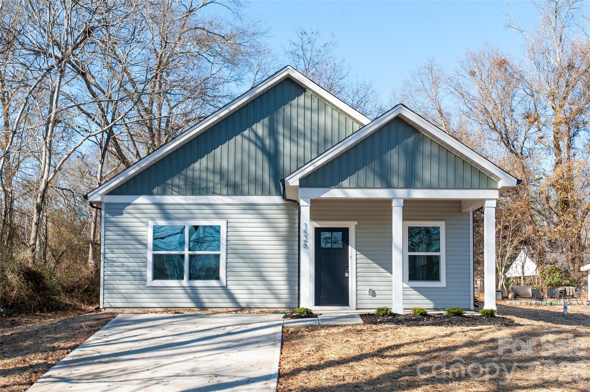 0 Lowesville Meadows Road Stanley, NC 28164 - Photo 2 of 25 a front view of a house with a yard
