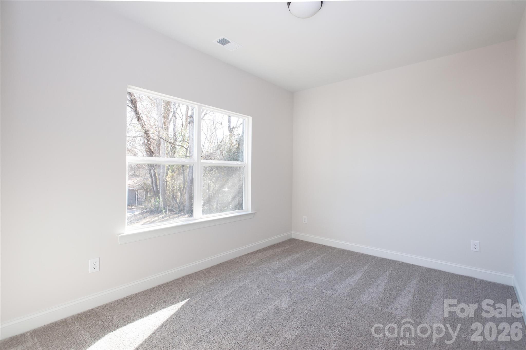 0 Lowesville Meadows Road Stanley, NC 28164 - Photo 22 of 25 an empty room with a window