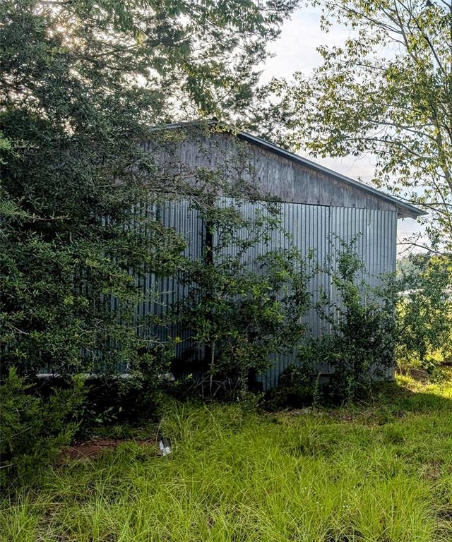 10404 Southwest 170th Street Archer, FL 32618 - Photo 3 of 10 a view of a backyard
