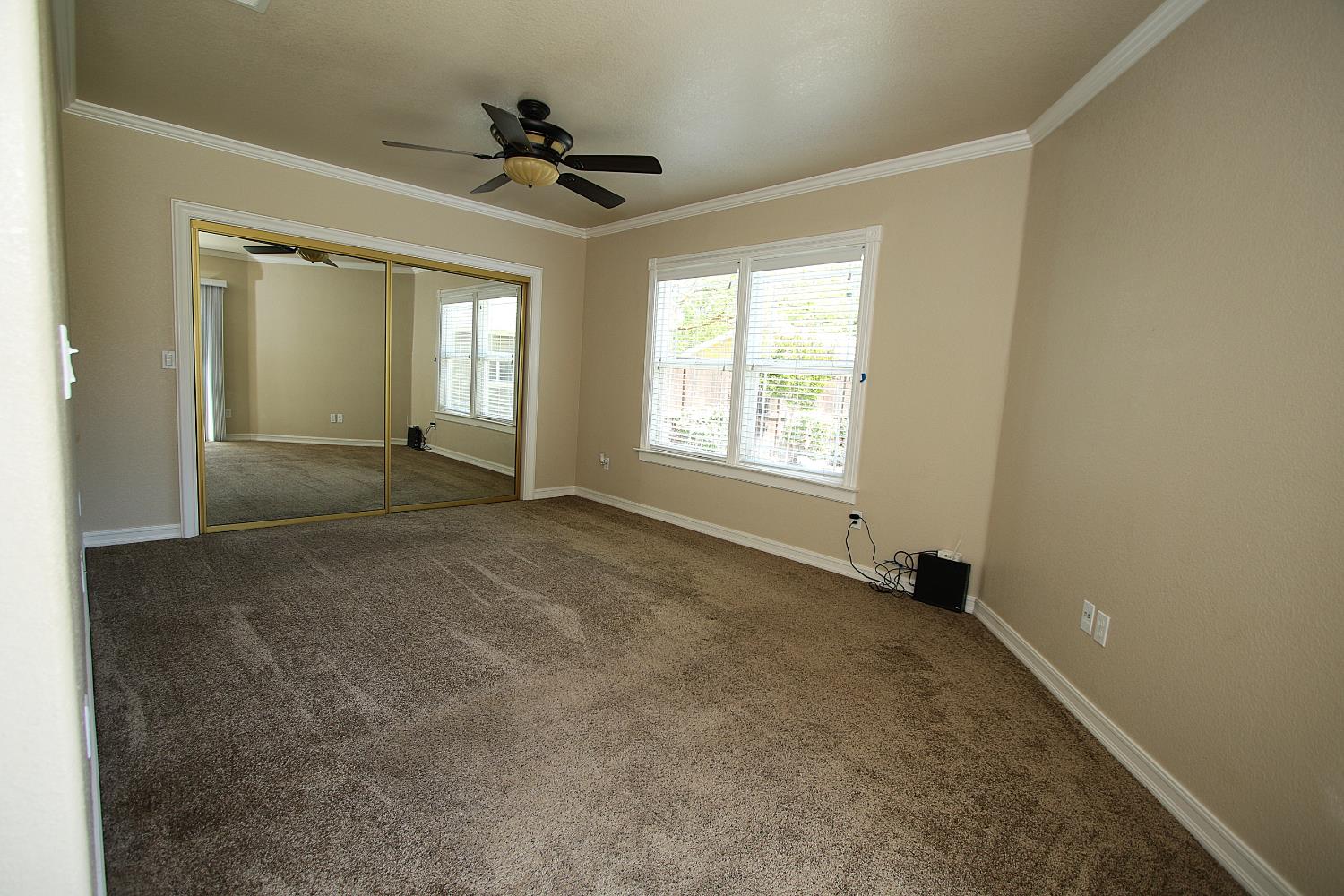 526 Melrose Street Modesto, CA 95354 - Photo 18 of 27 a view of an empty room with a window