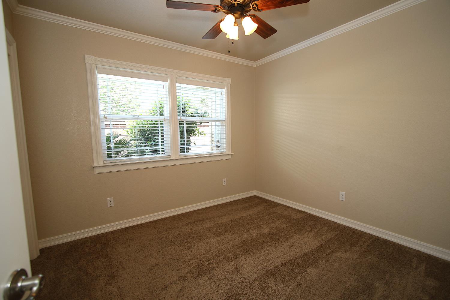 526 Melrose Street Modesto, CA 95354 - Photo 19 of 27 an empty room with a window