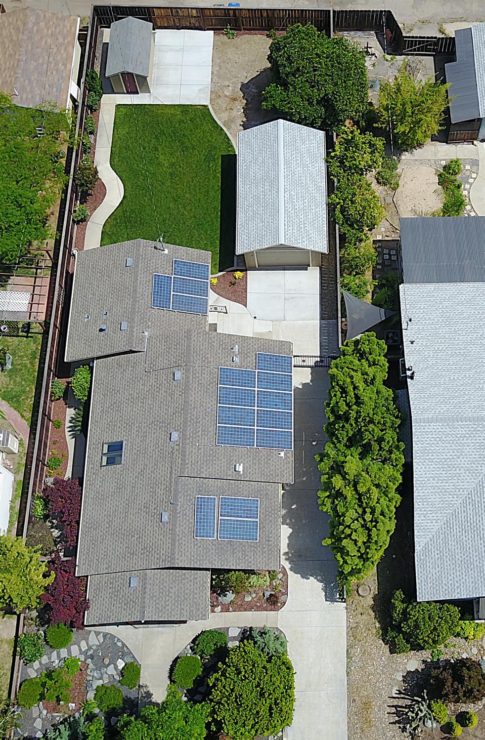 526 Melrose Street Modesto, CA 95354 - Photo 4 of 27 an aerial view of a house with a yard