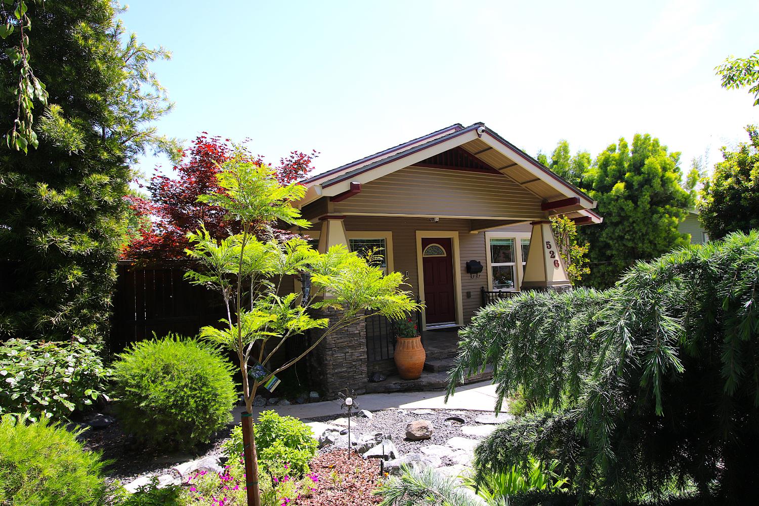 526 Melrose Street Modesto, CA 95354 - Photo 7 of 27 a front view of a house with a yard
