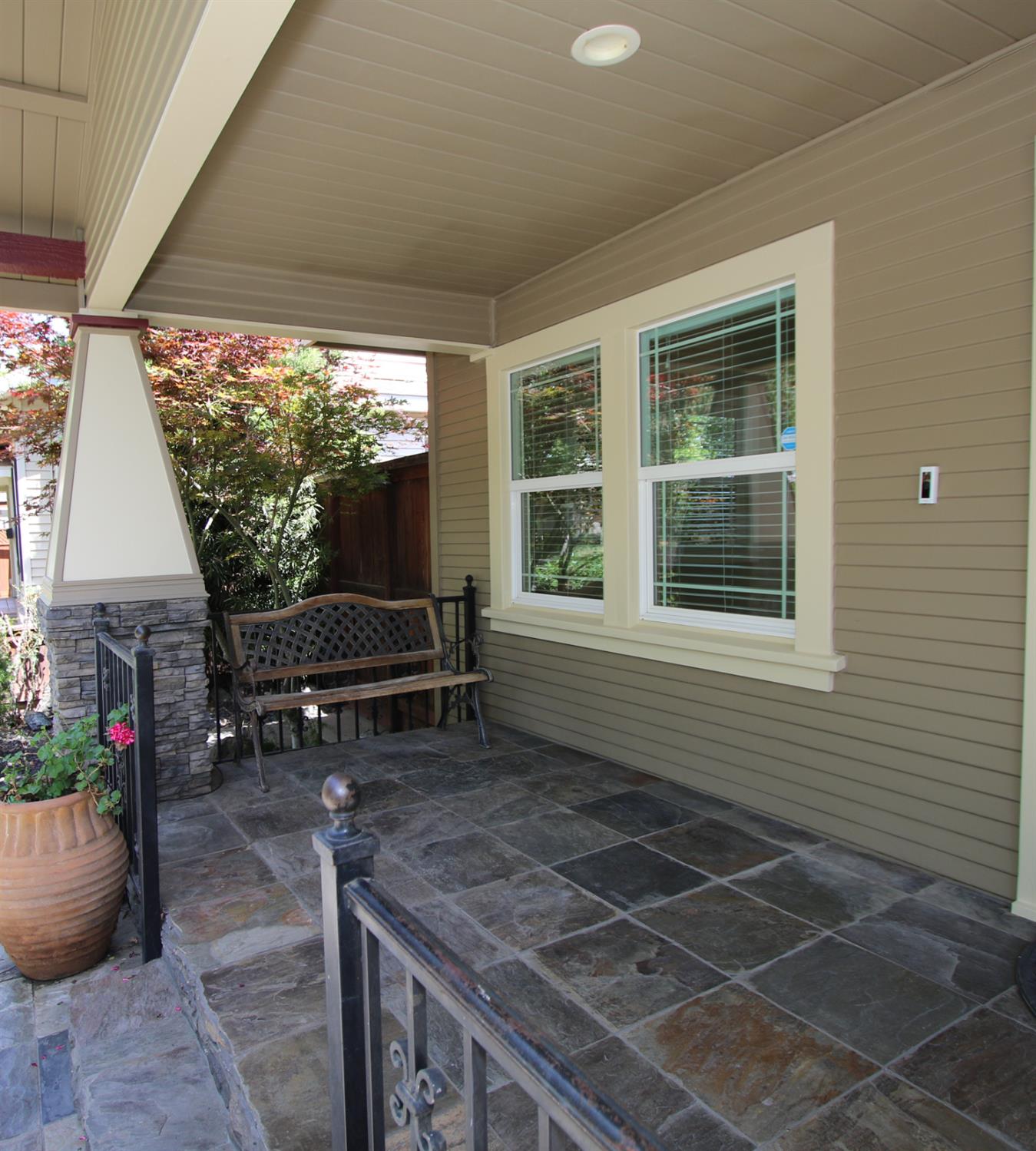 526 Melrose Street Modesto, CA 95354 - Photo 8 of 27 a room with patio entrance and a potted plant