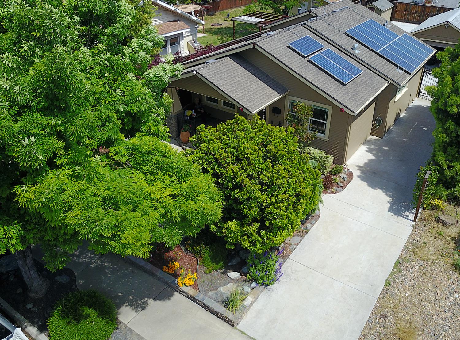 526 Melrose Street Modesto, CA 95354 - Photo 10 of 27 an aerial view of a house with a yard and potted plants