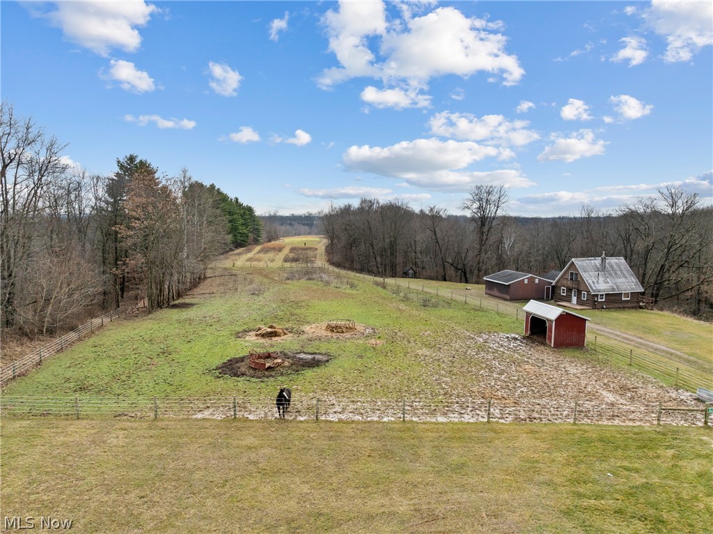 64508 Slade Road Cambridge, OH 43725 - Photo 43 of 50 View of yard featuring a view of rural / pastoral area and an outdoor structure