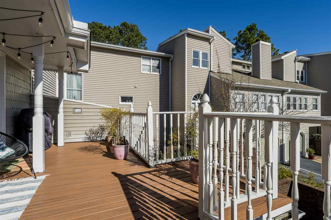 7010 Sandy Forks Road, Unit 207 Raleigh, NC 27609 - Photo 3 of 27 Spacious balcony for grilling and relaxing outside. Balcony