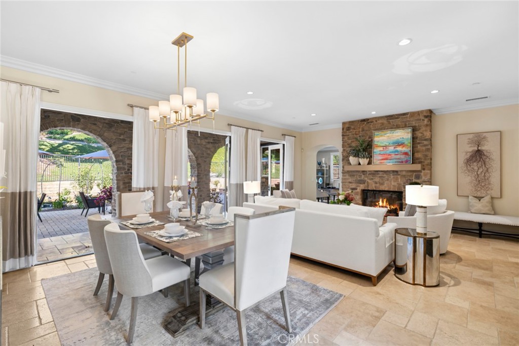 2 Ali Lane Ladera Ranch, CA 92694 - Photo 9 of 75 Dining room/living room fireplace view towards rear yard