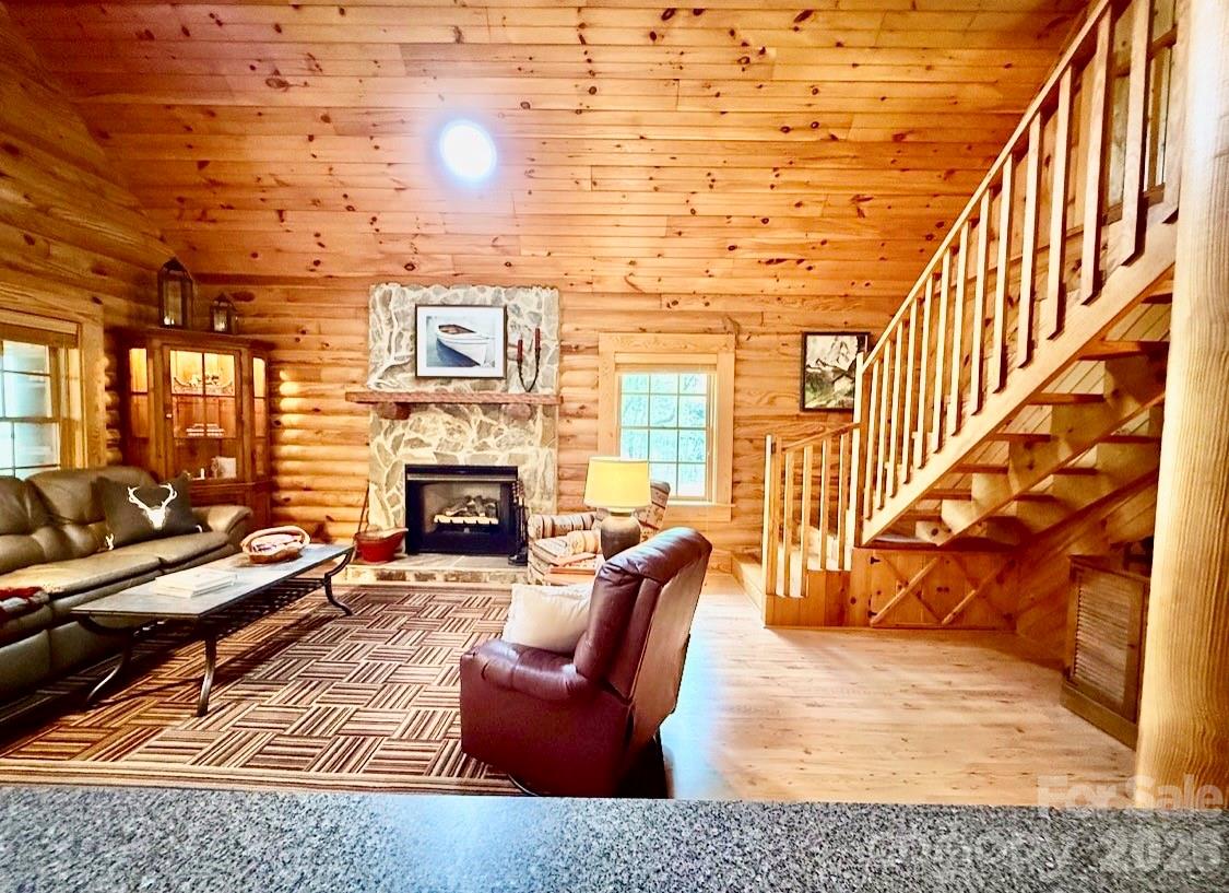 57 Club Lane Winnsboro, SC 29180 - Photo 13 of 48 a living room with furniture and a fireplace