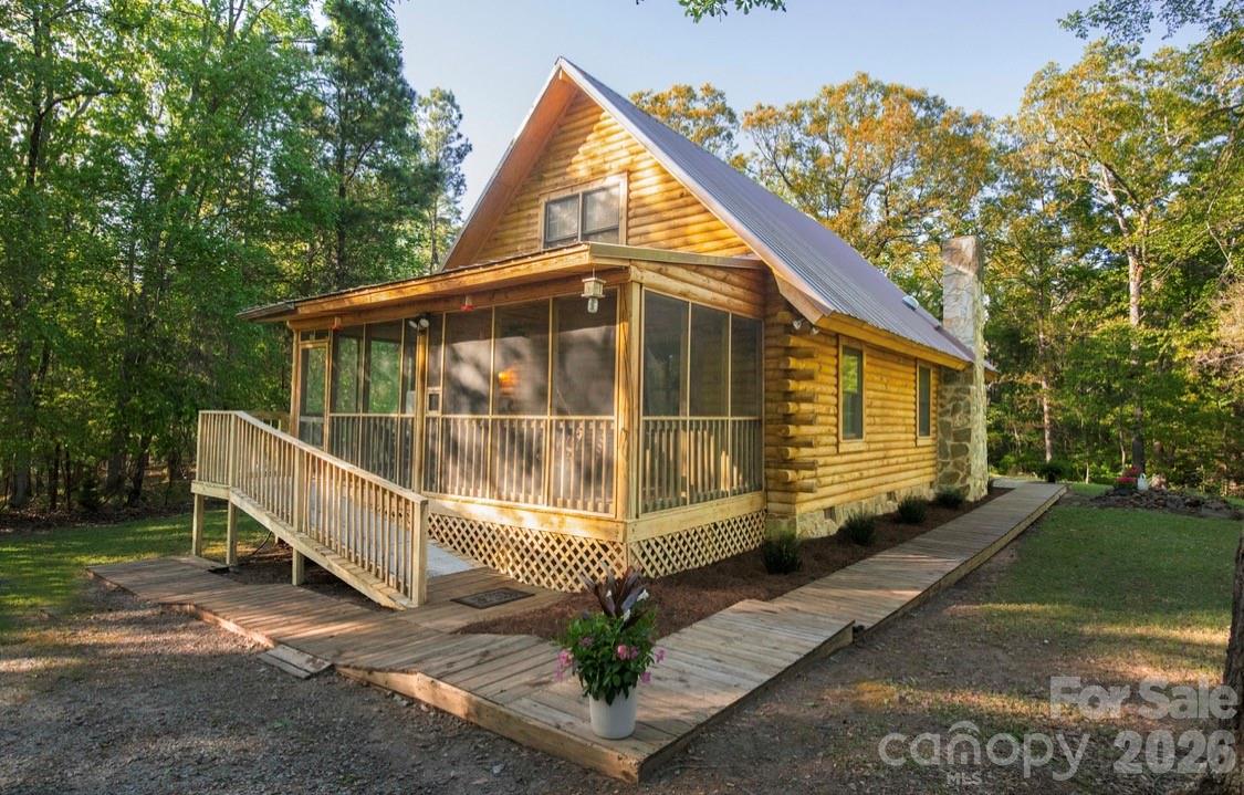 57 Club Lane Winnsboro, SC 29180 - Photo 2 of 48 a view of a house with a yard