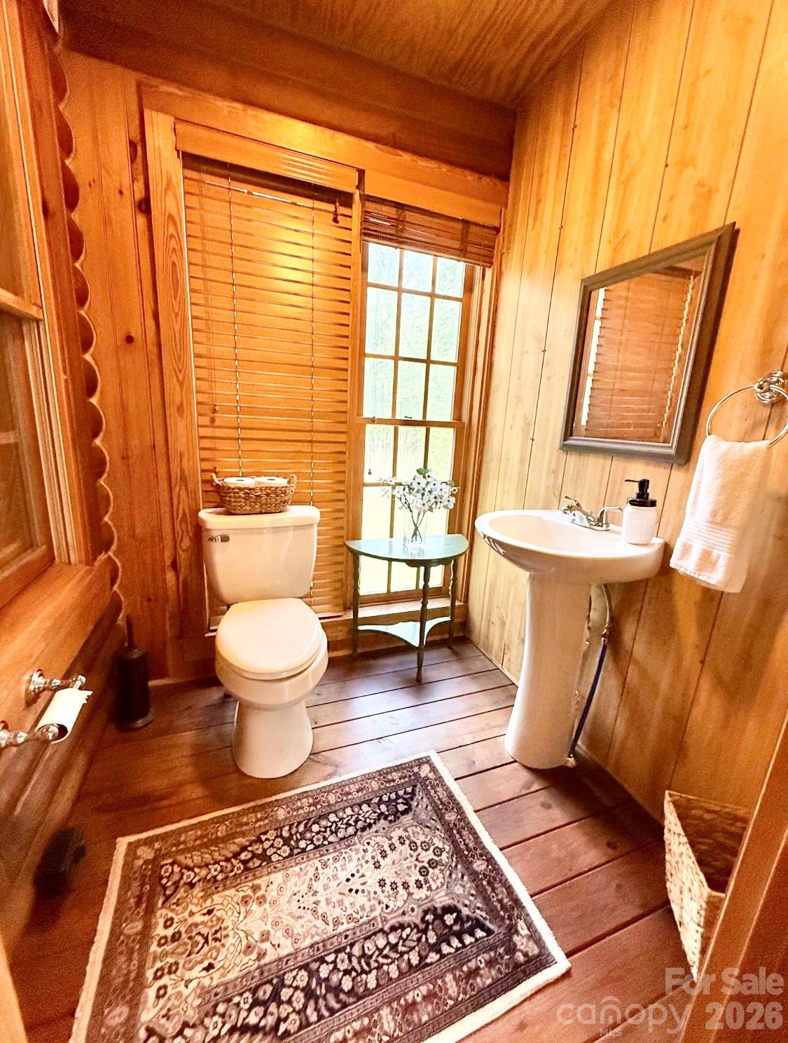 57 Club Lane Winnsboro, SC 29180 - Photo 24 of 48 a spacious bathroom with a bathtub toilet and window