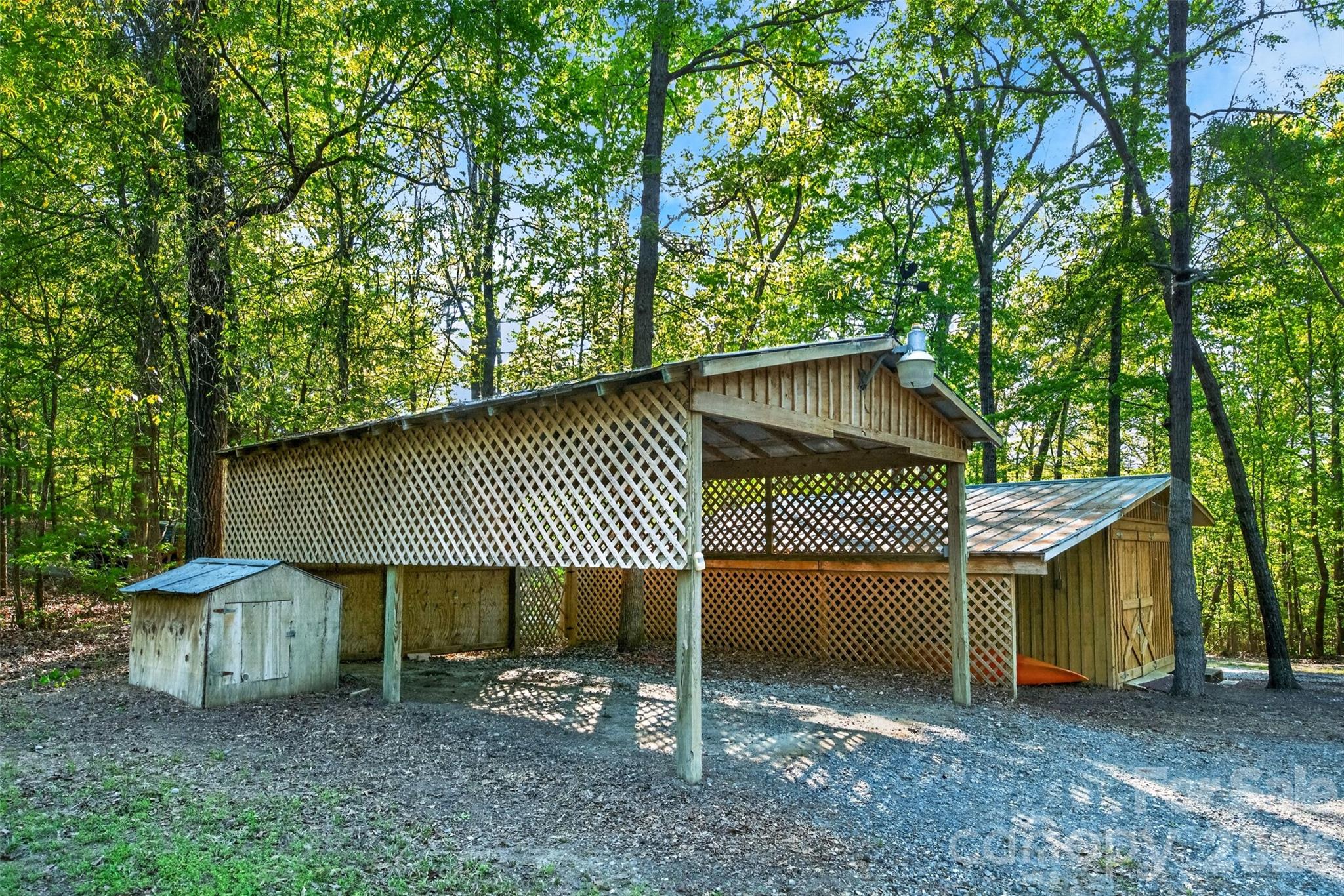 57 Club Lane Winnsboro, SC 29180 - Photo 28 of 48 a view of a house with a yard and wooden fence
