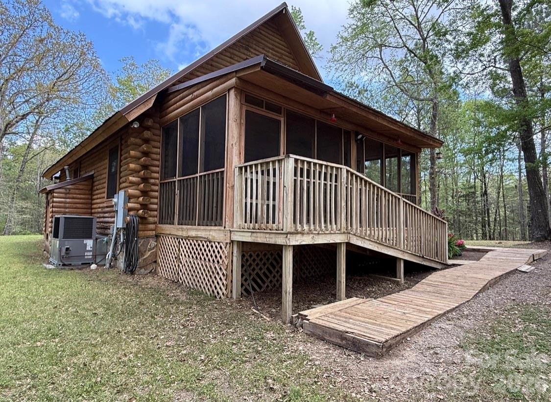 57 Club Lane Winnsboro, SC 29180 - Photo 37 of 48 a view of a house with a yard and deck