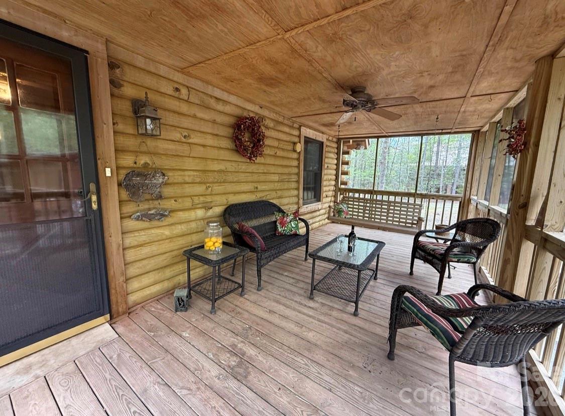 57 Club Lane Winnsboro, SC 29180 - Photo 4 of 48 a outdoor living space with furniture