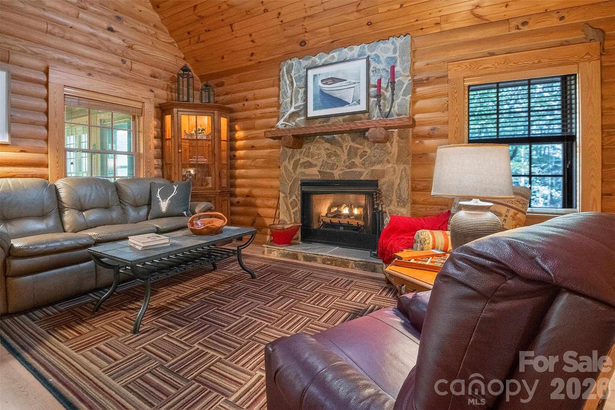 57 Club Lane Winnsboro, SC 29180 - Photo 10 of 48 a living room with furniture and a fireplace
