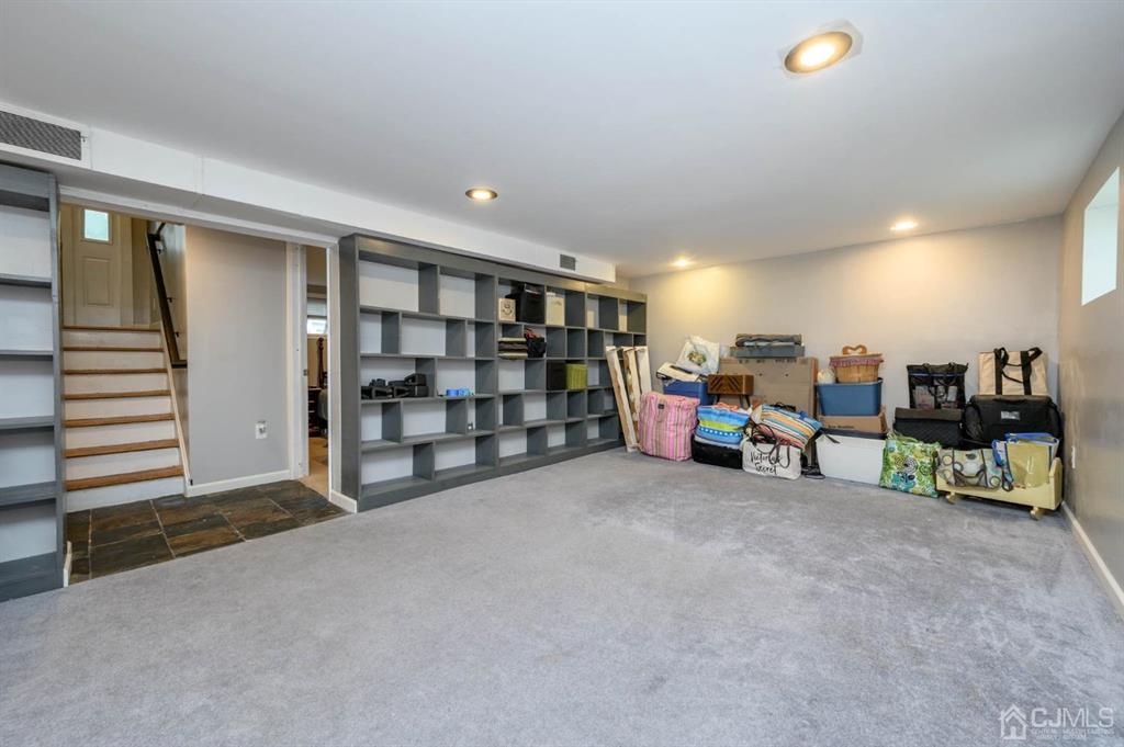 22 Vista Road Hamilton, NJ 08690 - Photo 23 of 38 a view of a livingroom with furniture and storage