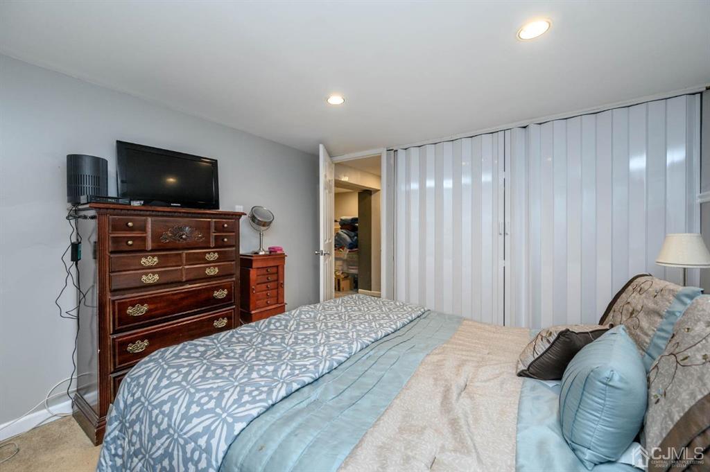 22 Vista Road Hamilton, NJ 08690 - Photo 26 of 38 a bedroom with a bed and television