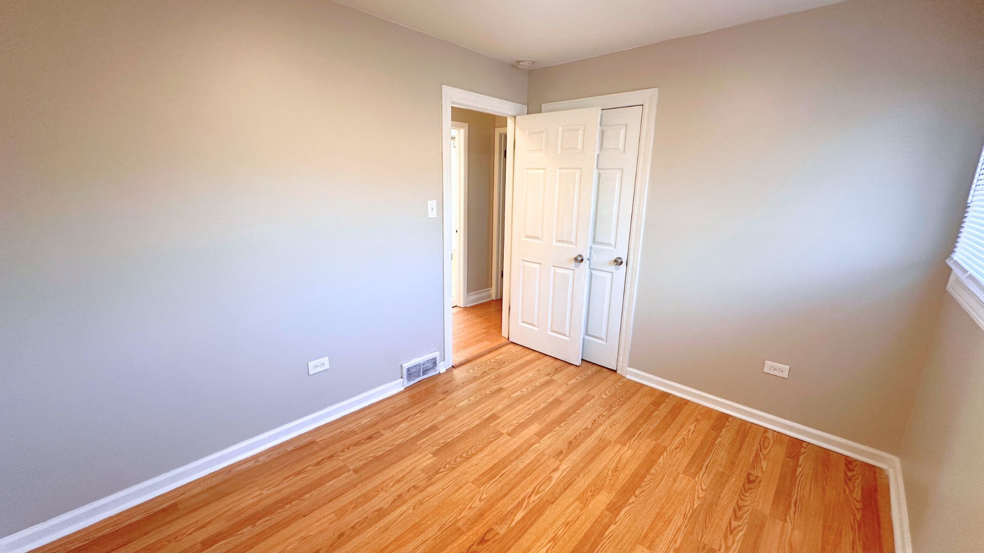 3416 West 124th Street Alsip, IL 60803 - Photo 11 of 19 a view of an empty room with wooden floor