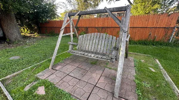 a view of backyard with small cabin