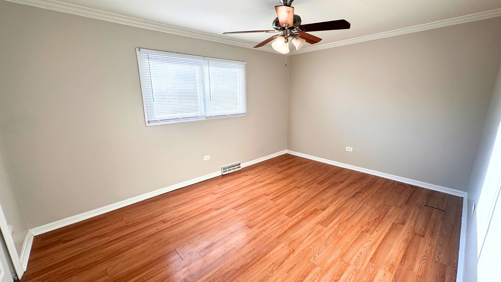 3416 West 124th Street Alsip, IL 60803 - Photo 6 of 19 wooden floor in an empty room with a window