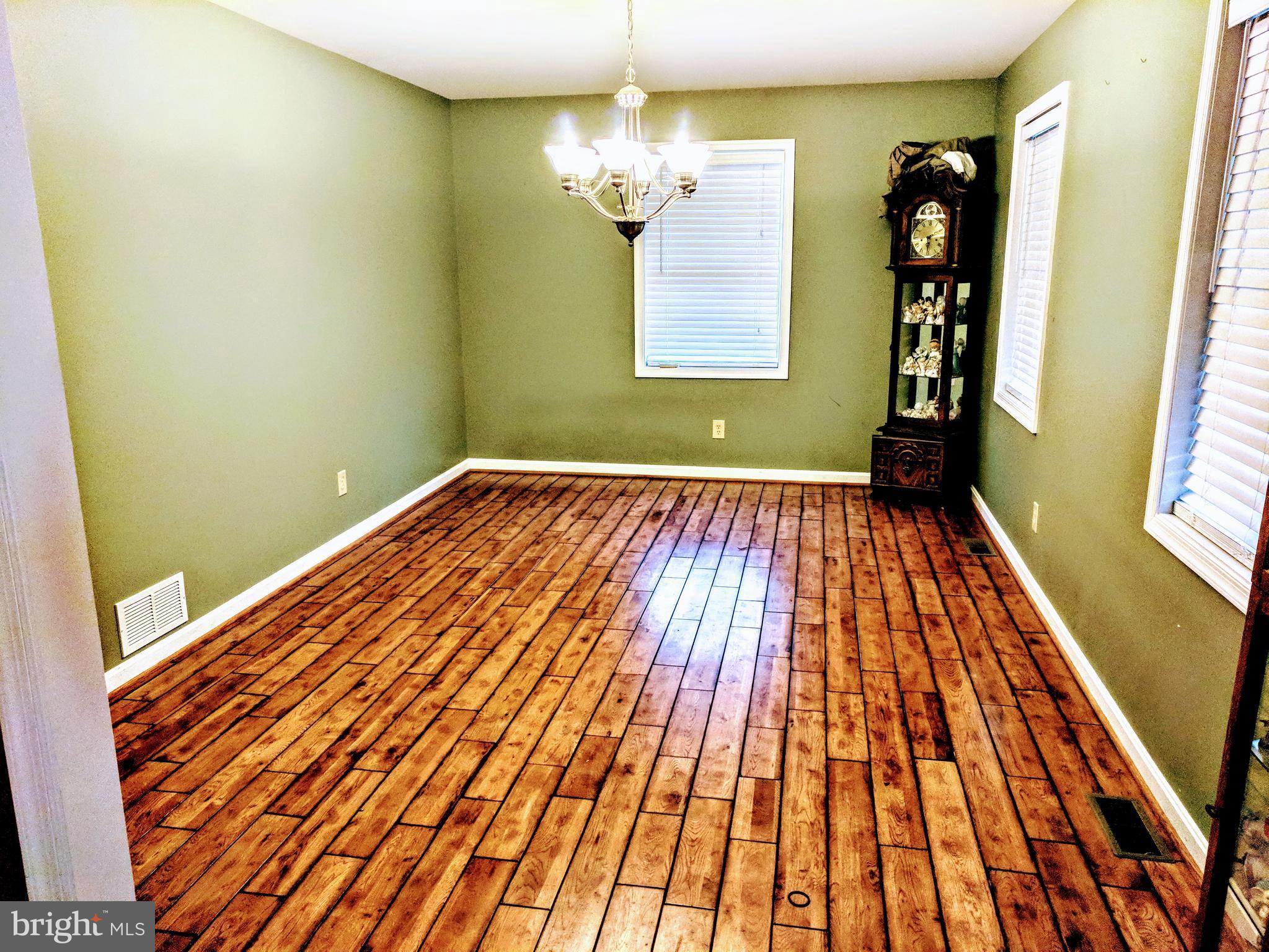 13180 Independence Road Clear Spring, MD 21722 - Photo 11 of 30 Gleaming Hardwoods in Dining Room