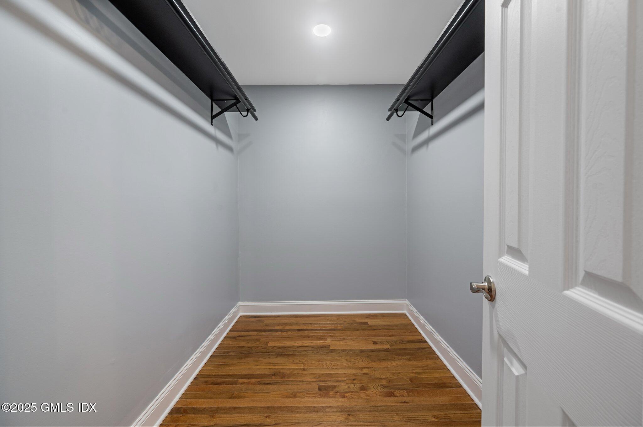 40 Silo Circle Riverside, CT 06878 - Photo 22 of 45 a view of a room with wooden floor and staircase