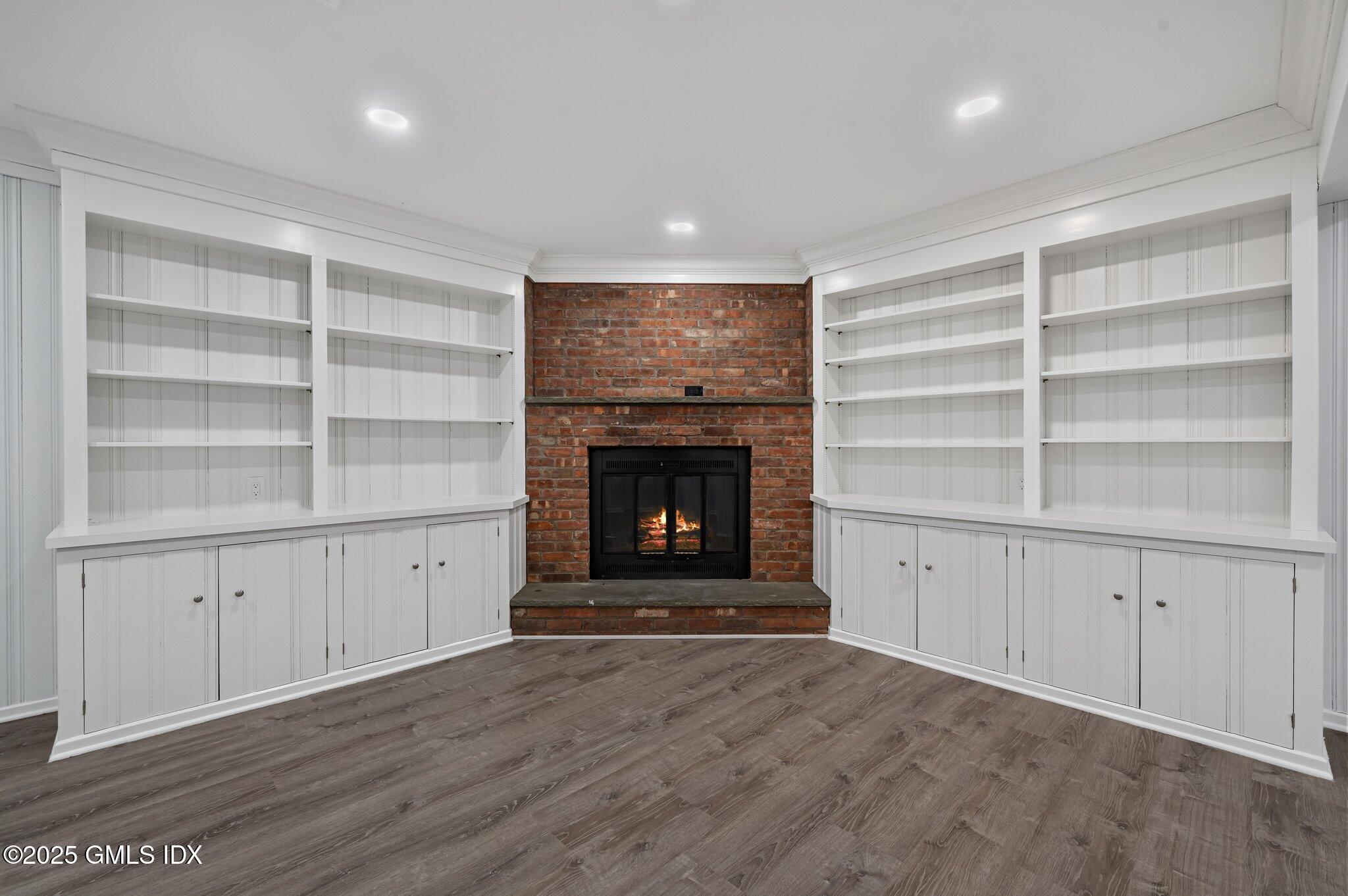 40 Silo Circle Riverside, CT 06878 - Photo 30 of 45 a view of an empty room with a fireplace and a window