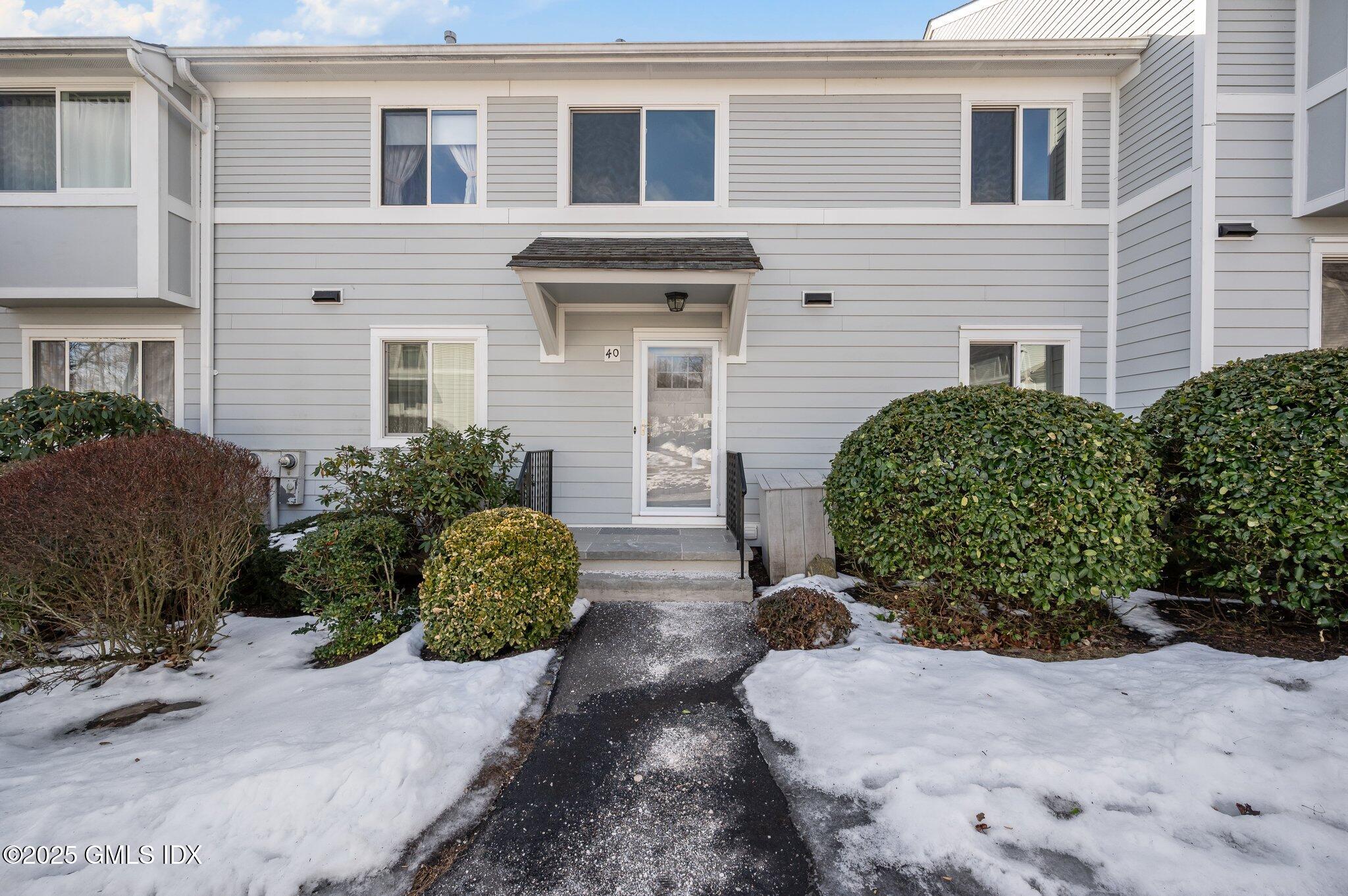 40 Silo Circle Riverside, CT 06878 - Photo 3 of 45 a front view of a house with a yard