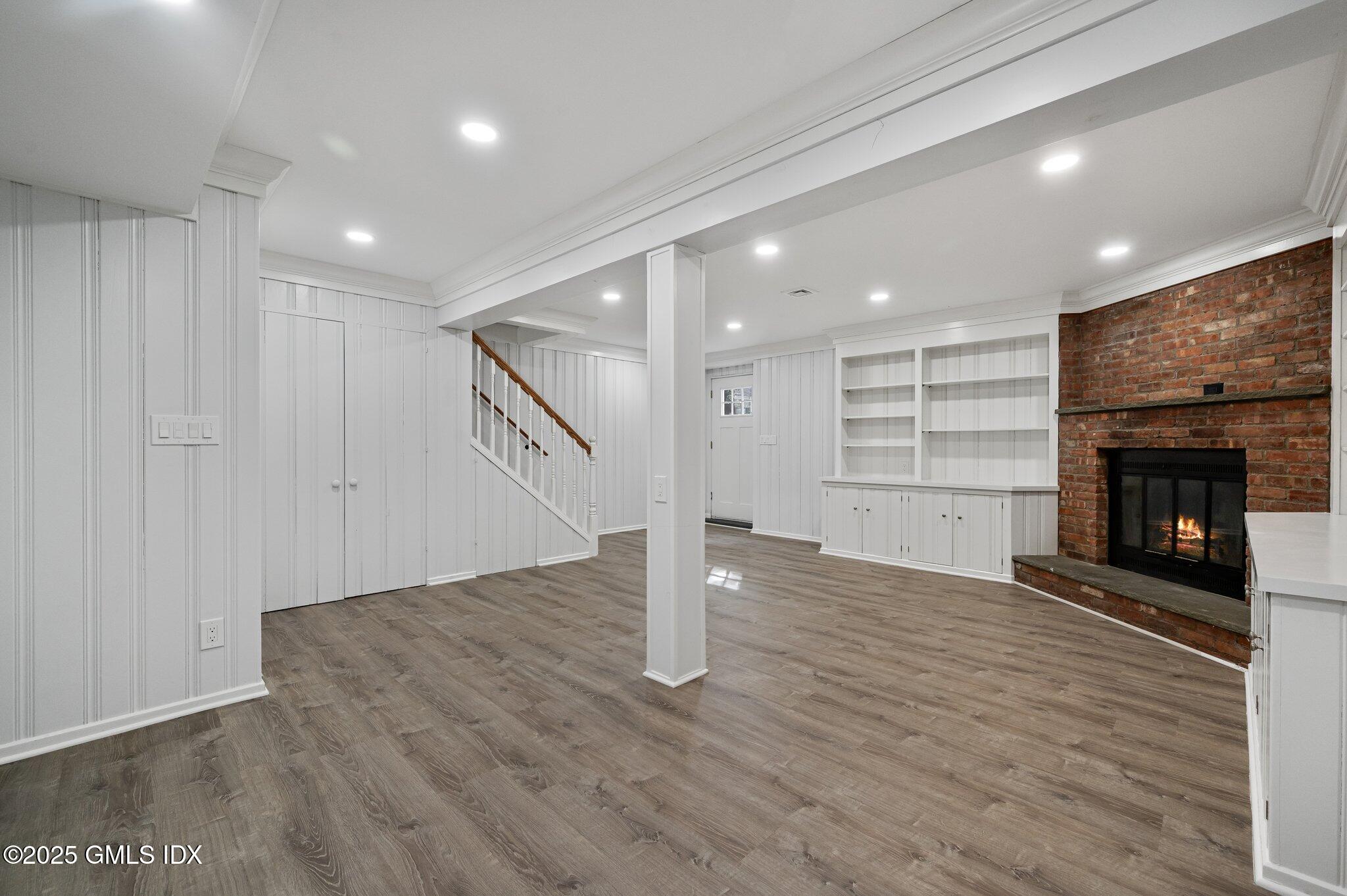 40 Silo Circle Riverside, CT 06878 - Photo 31 of 45 a view of an empty room with a fireplace and a window