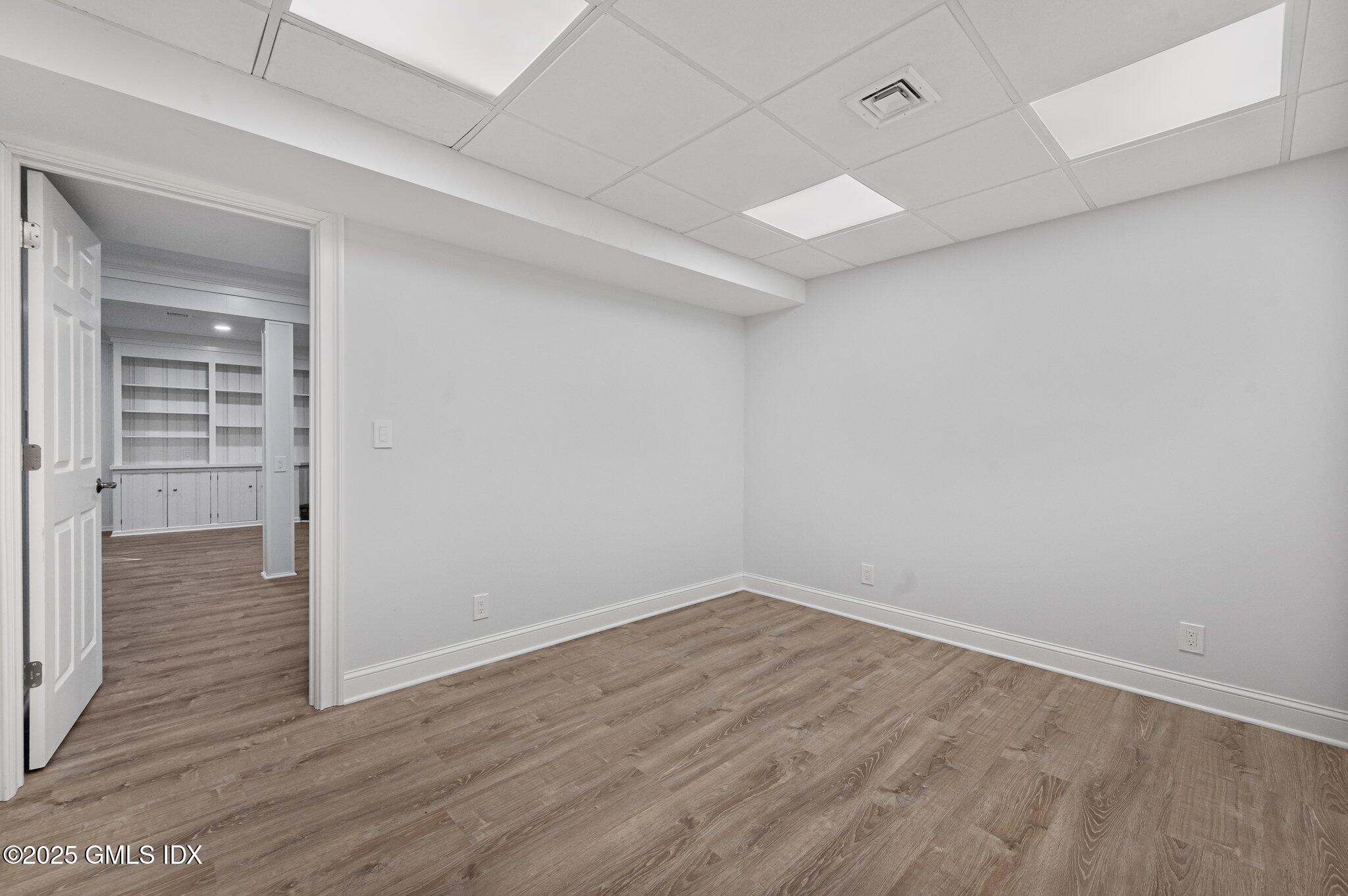 40 Silo Circle Riverside, CT 06878 - Photo 33 of 45 wooden floor in an empty room