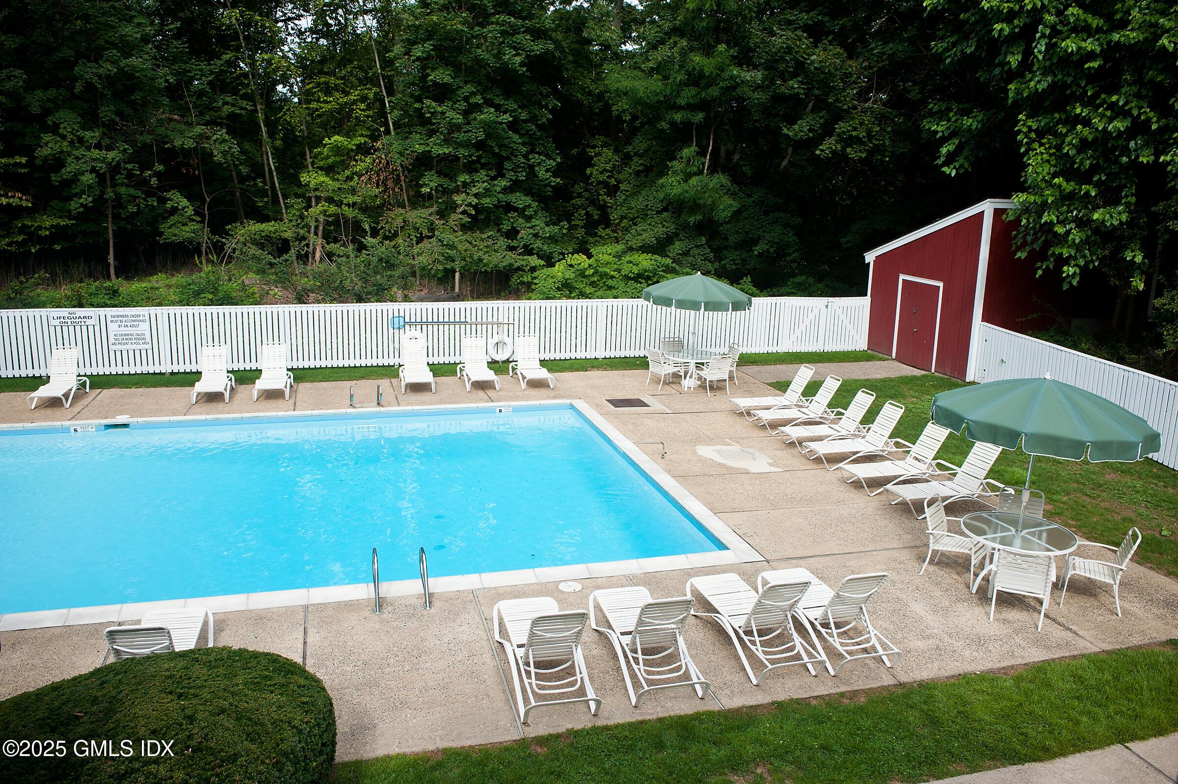 40 Silo Circle Riverside, CT 06878 - Photo 39 of 45 a view of a chairs and table in the patio