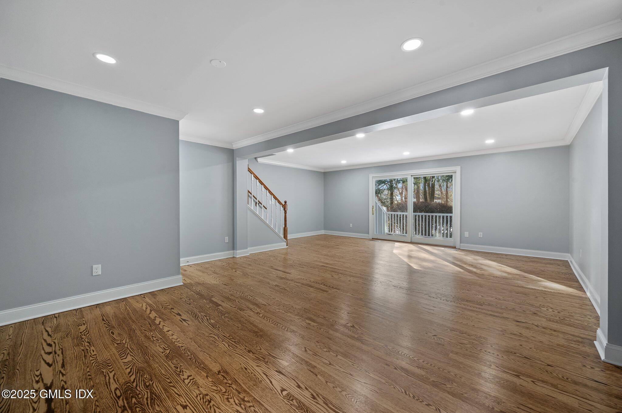 40 Silo Circle Riverside, CT 06878 - Photo 5 of 45 a view of empty room with wooden floor and fan