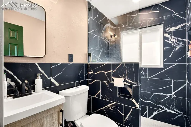 a bathroom with a sink and a toilet